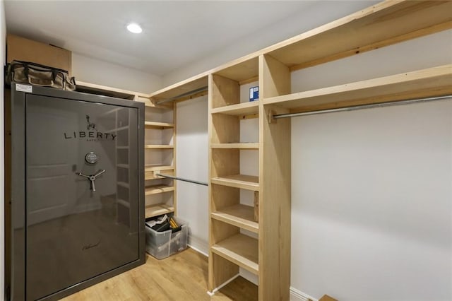 spacious closet featuring light wood-type flooring
