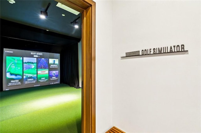 recreation room featuring carpet floors and golf simulator