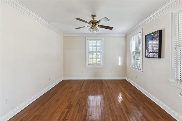 empty room with ornamental molding, a ceiling fan, hardwood / wood-style flooring, and baseboards