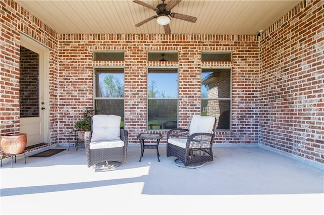 view of patio / terrace featuring ceiling fan