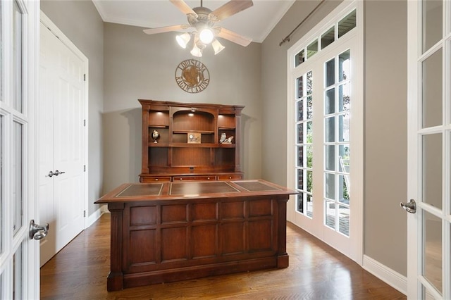 office featuring crown molding, french doors, and dark hardwood / wood-style flooring