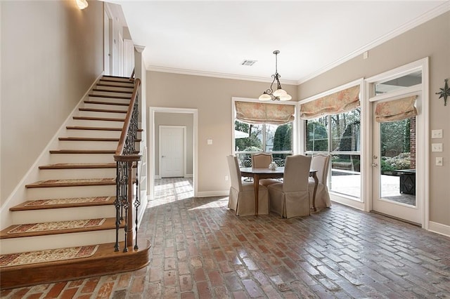 unfurnished dining area with ornamental molding