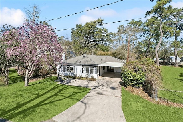 single story home with a carport and a front yard