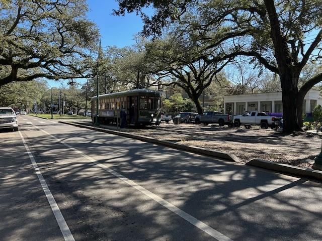 view of road featuring curbs