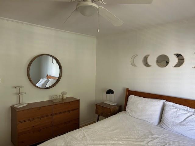 4007 St Charles Ave Unit 319, New Orleans, LA 70115 - bedroom featuring a ceiling fan