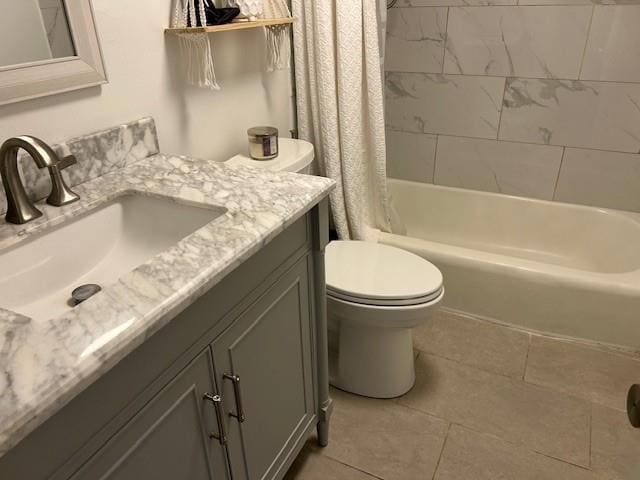 4007 St Charles Ave Unit 319, New Orleans, LA 70115 - bathroom with vanity, tile patterned floors, and shower / tub combo