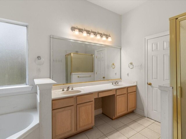 1220 Atalin St, Mandeville, LA 70448 - bathroom featuring tile patterned flooring, a stall shower, double vanity, and a garden tub