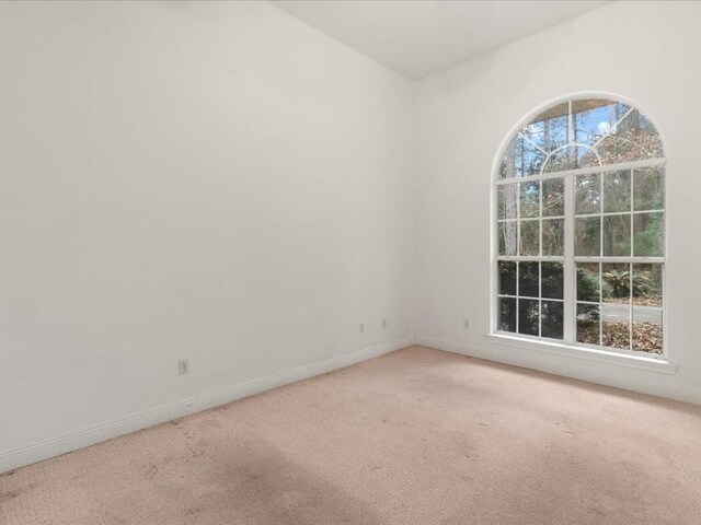 1220 Atalin St, Mandeville, LA 70448 - carpeted empty room featuring baseboards