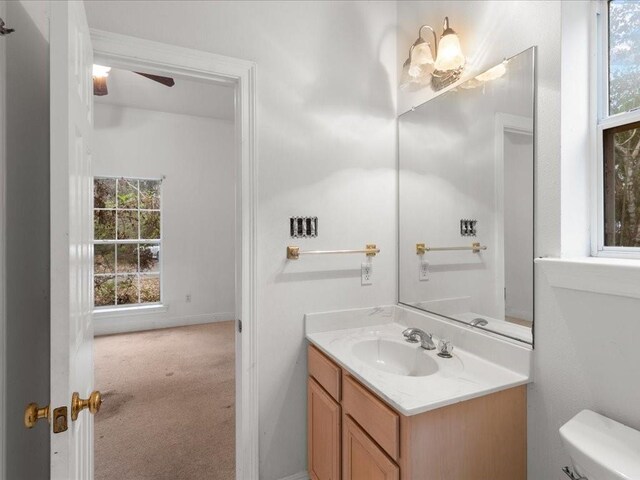 1220 Atalin St, Mandeville, LA 70448 - half bath featuring toilet, vanity, and a ceiling fan