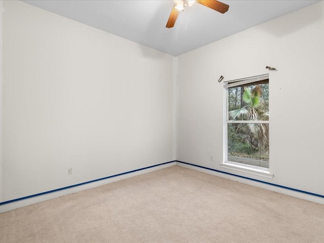 1220 Atalin St, Mandeville, LA 70448 - carpeted empty room with ceiling fan and baseboards