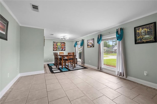 unfurnished dining area featuring light tile patterned floors and crown molding