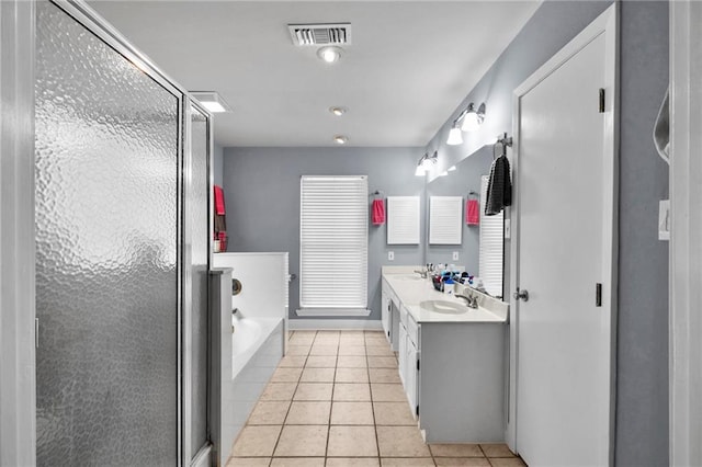 bathroom with separate shower and tub, vanity, and tile patterned flooring