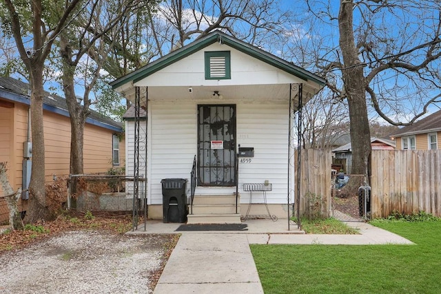 view of outbuilding with a yard