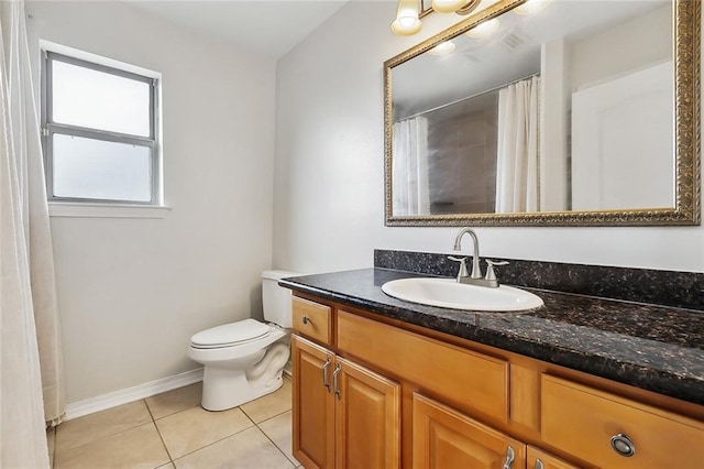 bathroom with tile patterned floors, vanity, a shower with shower curtain, and toilet