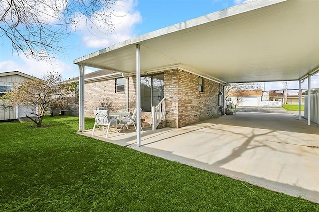 view of patio / terrace with a carport