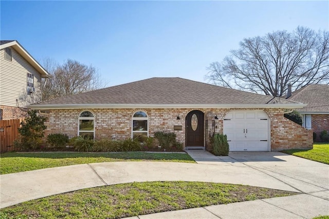 single story home with brick siding, roof with shingles, driveway, and an attached garage