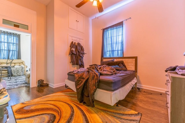 226062 N Roman St, New Orleans, LA 70117 - bedroom with baseboards, a ceiling fan, and wood finished floors