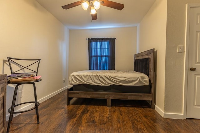 226062 N Roman St, New Orleans, LA 70117 - bedroom featuring wood finished floors, a ceiling fan, and baseboards