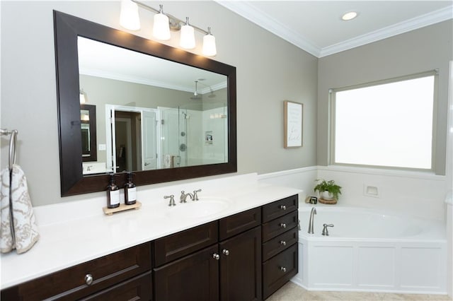 full bath with a shower stall, vanity, a bath, and crown molding