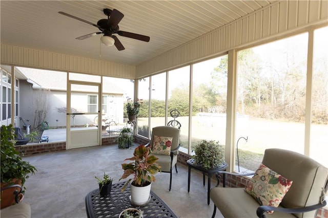 sunroom with a ceiling fan