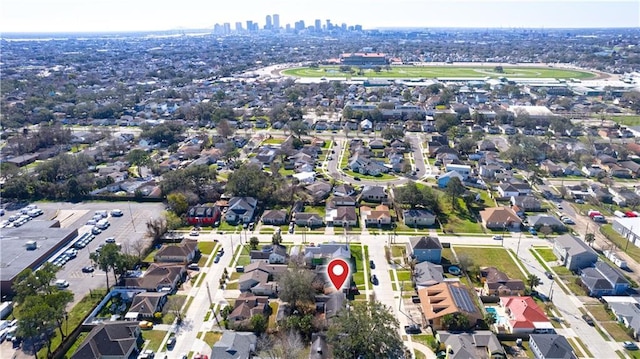 birds eye view of property featuring a residential view and a city view