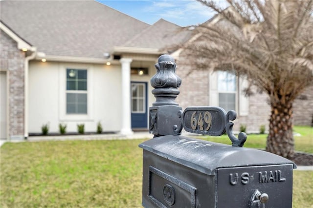 details with a downspout and gutters