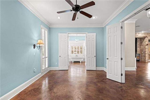 empty room with concrete flooring, ornamental molding, a ceiling fan, and baseboards