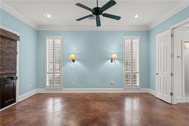 interior space with ornamental molding, concrete floors, and baseboards