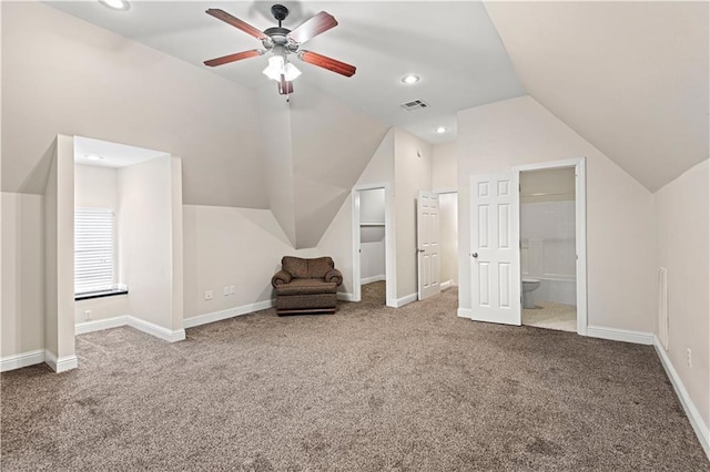 bonus room featuring carpet, visible vents, vaulted ceiling, and baseboards