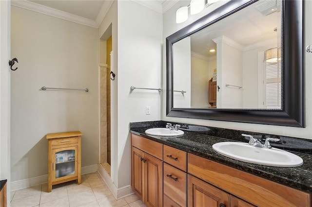 1042 Mariners Cove Blvd, Slidell, LA 70458 - bathroom featuring double vanity, a tile shower, ornamental molding, and tile patterned floors