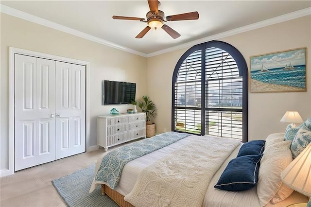 1042 Mariners Cove Blvd, Slidell, LA 70458 - carpeted bedroom featuring ornamental molding, a closet, and ceiling fan