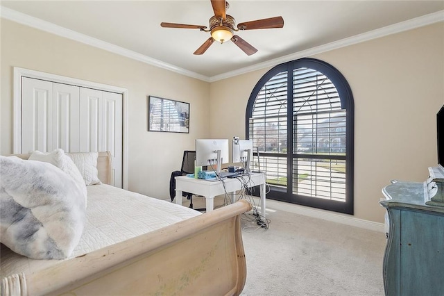 1042 Mariners Cove Blvd, Slidell, LA 70458 - bedroom featuring light colored carpet, ornamental molding, ceiling fan, and a closet
