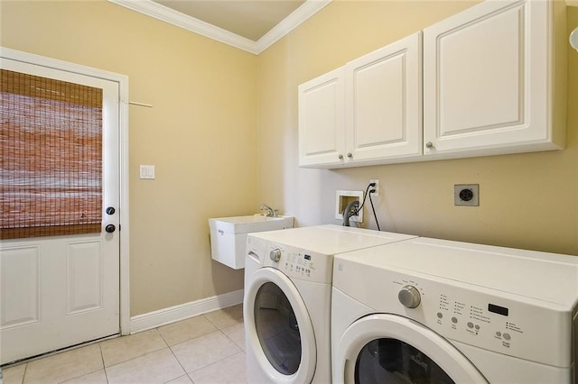 1042 Mariners Cove Blvd, Slidell, LA 70458 - laundry room with cabinet space, ornamental molding, washer and dryer, and light tile patterned flooring