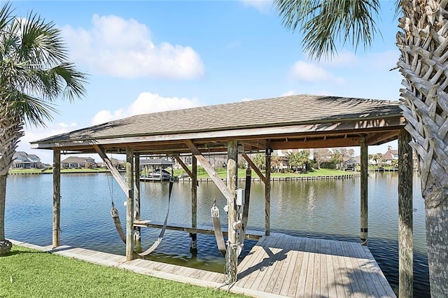 1042 Mariners Cove Blvd, Slidell, LA 70458 - dock with boat lift and a water view