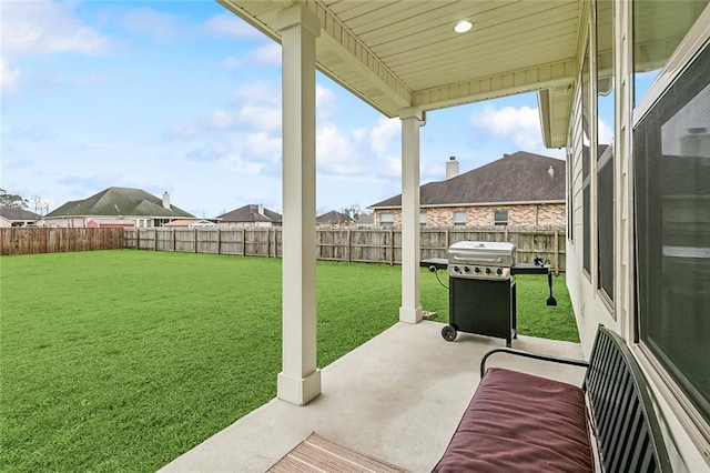 view of patio / terrace with a fenced backyard and area for grilling