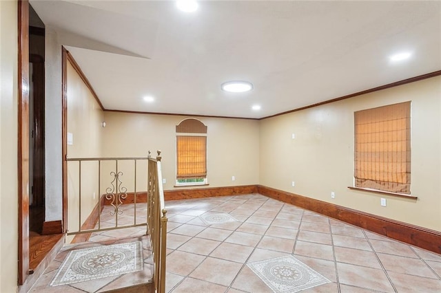 5116 Franklin Ave, New Orleans, LA 70122 - spare room featuring ornamental molding, recessed lighting, tile patterned floors, and baseboards