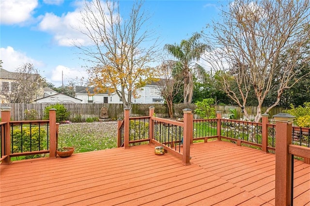 5116 Franklin Ave, New Orleans, LA 70122 - wooden terrace with a fenced backyard