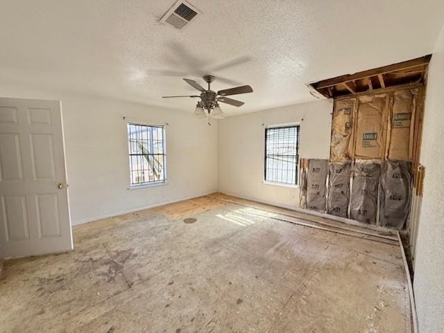 2340 Rex Pl, New Orleans, LA 70125 - spare room featuring a ceiling fan, visible vents, and a textured ceiling