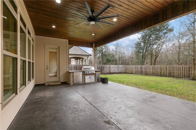 view of patio featuring ceiling fan, a fenced backyard, area for grilling, and a grill