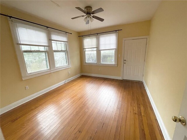 2525-27 Nashville Ave, New Orleans, LA 70115 - unfurnished room with light wood-type flooring, baseboards, and a ceiling fan