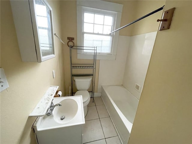 2525-27 Nashville Ave, New Orleans, LA 70115 - bathroom featuring toilet, tile patterned flooring, tub / shower combination, and vanity