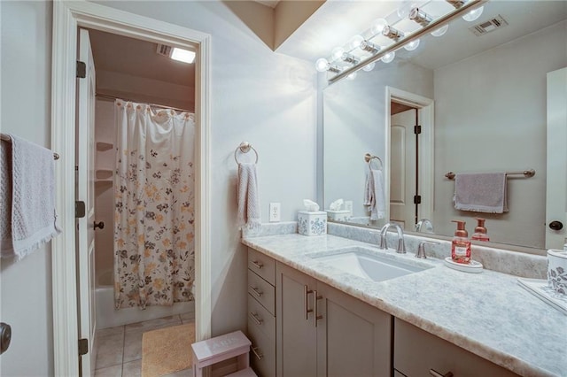 full bath with shower / bath combination with curtain, vanity, visible vents, and tile patterned floors