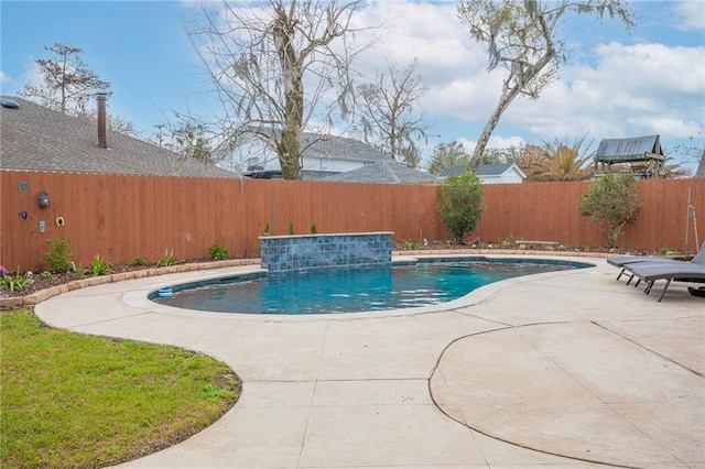 view of swimming pool featuring a patio area, a fenced backyard, and a fenced in pool