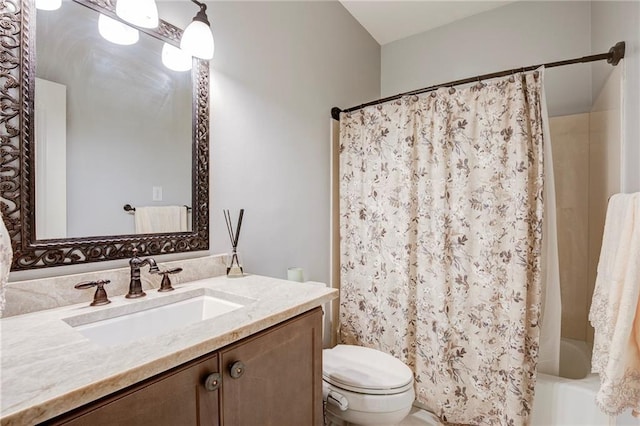 bathroom with toilet, shower / tub combo with curtain, and vanity