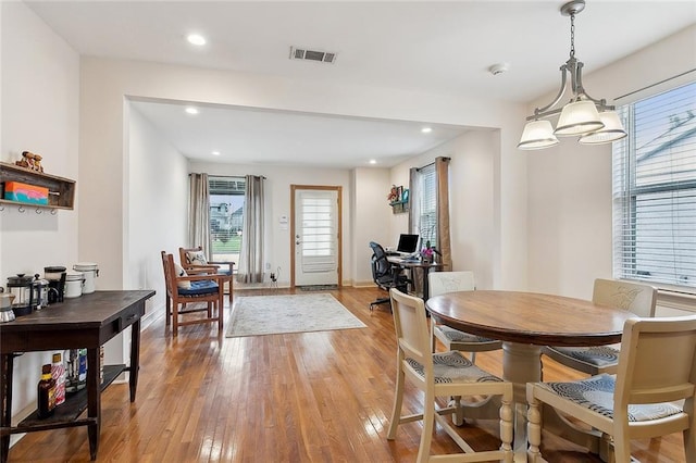 dining area featuring recessed lighting, baseboards, visible vents, and light wood finished floors