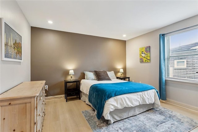 bedroom featuring recessed lighting, light wood-style flooring, and baseboards