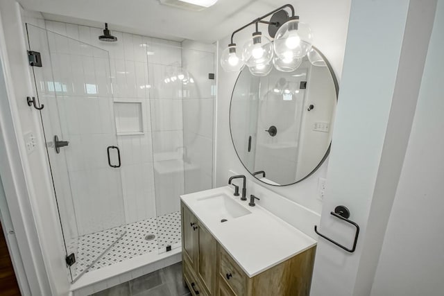 full bath featuring a shower stall and vanity