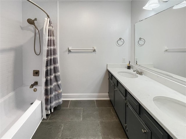 bathroom featuring a sink, shower / bathtub combination with curtain, baseboards, and double vanity