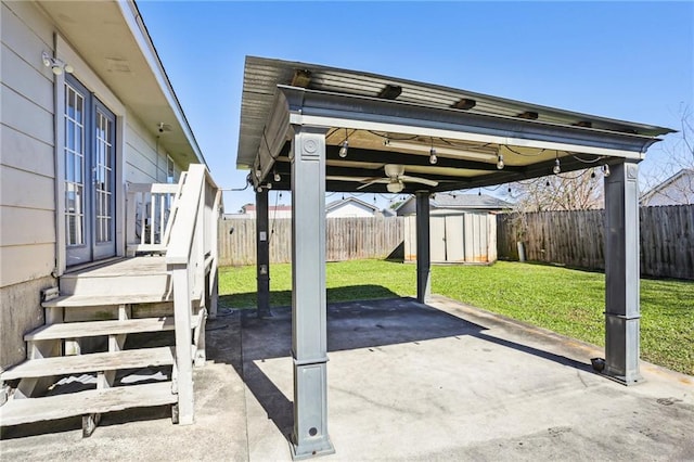 3244 Continental Dr, Kenner, LA 70065 - view of patio / terrace with a storage shed, an outbuilding, and a fenced backyard