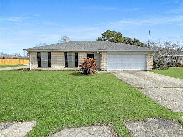 ranch-style home with an attached garage, brick siding, driveway, and a front lawn